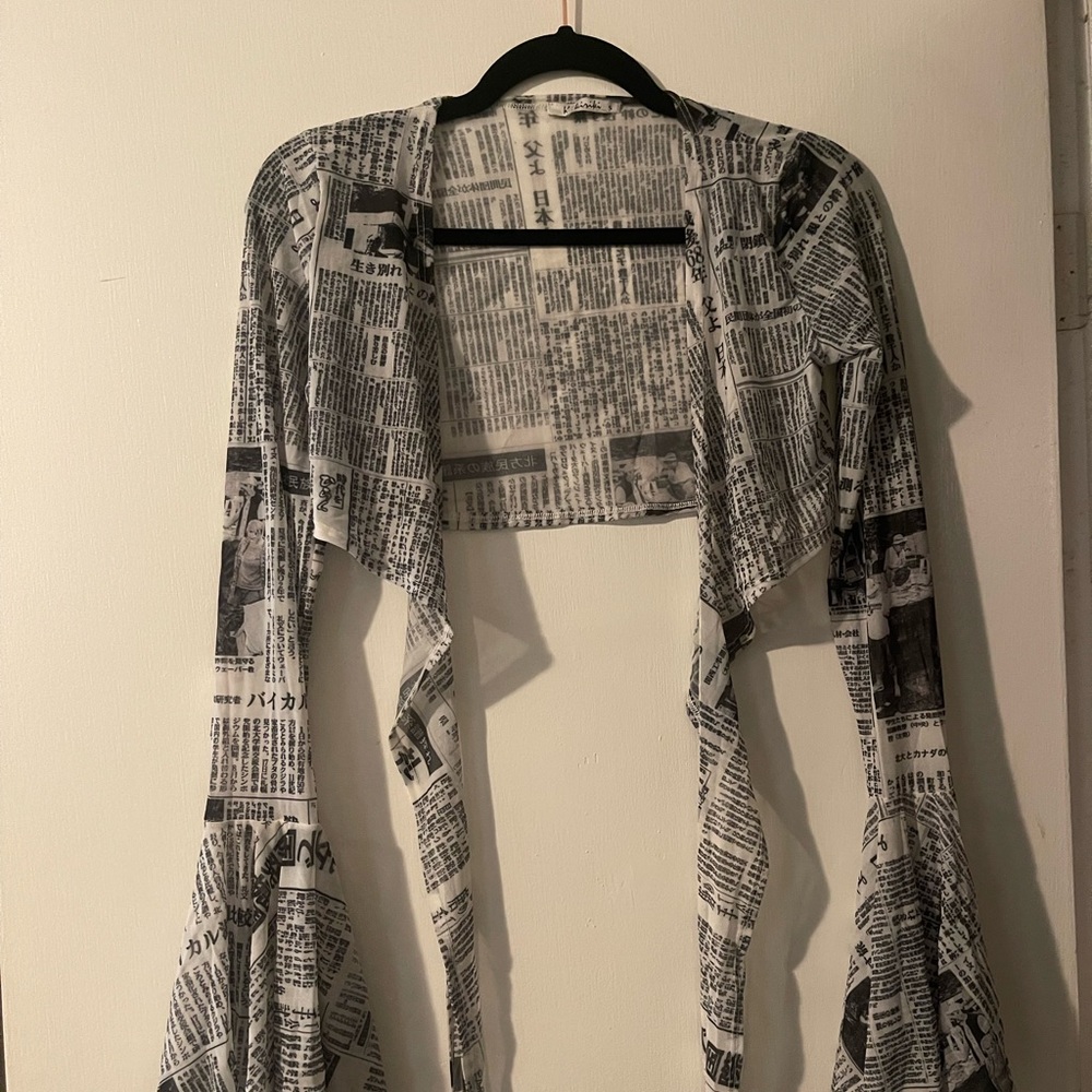 Black and white newspaper print top with bell sleeves and front tie #bellSleeves